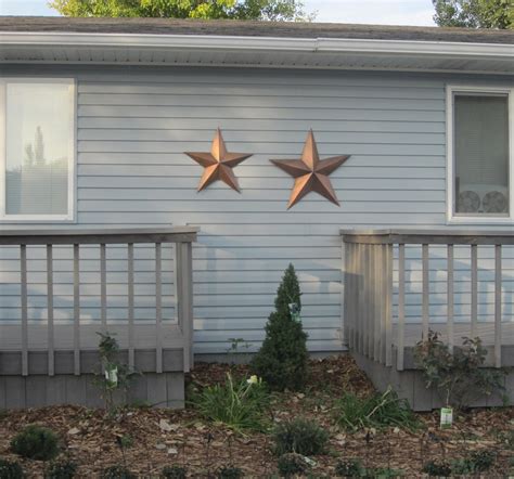 metal stars on houses|metal stars in a house.